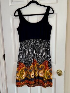 Torrid black and orange paisley print dress with a flowy skirt large